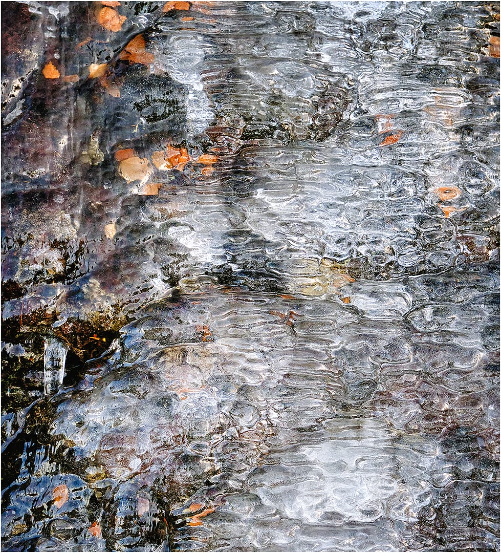 18 ICE FLOW ON ROCK FACE by Richard Burn