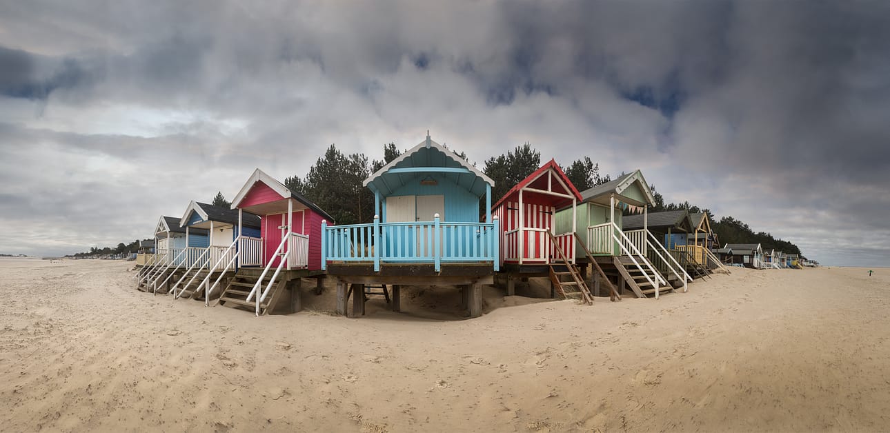 21 OVER WINTERING BEACH HUTS by Roger Green